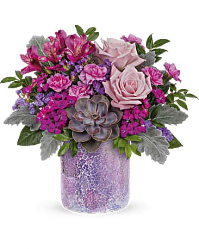 <div id="mark-3" class="m-pdp-tabs-marketing-description">As magical as sunset in the desert. Luscious pink roses and a sculptural succulent get the glamorous treatment in a shimmering mosaic glass vase.</div>
&nbsp;
<div id="desc-3">This chic bouquet features light pink roses, purple alstroemeria, miniature lavender carnations, dark pink sweet william, lavender sinuata statice, dusty miller, huckleberry and a large green echeveria succulent plant.</div>