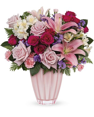 <div id="mark-3" class="m-pdp-tabs-marketing-description">Make mom's heart dance with this fabulous Mother's Day gift of luxurious lilies and roses in a European glass vase with shimmering metallic finish.</div>
<p>&nbsp;</p>
<div id="desc-3">Pink roses, hot pink spray roses, white alstroemeria, pink asiatic lilies, miniature pink carnations and lavender sinuata statice are arranged with leatherleaf fern.</div>