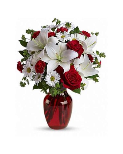 <div class="m-pdp-tabs-description">
<div id="mark-1" class="m-pdp-tabs-marketing-description">
<p> </p>
<hr />
<p>The spirit of love and romance is beautifully captured in this enchanting bouquet. It's the perfect gift for anyone you love.
</p></div>
</div>
<p>Red roses and carnations are exquisitely arranged with white asiatic lilies and chrysanthemums in a ruby red glass vase. It's lovely.</p>
