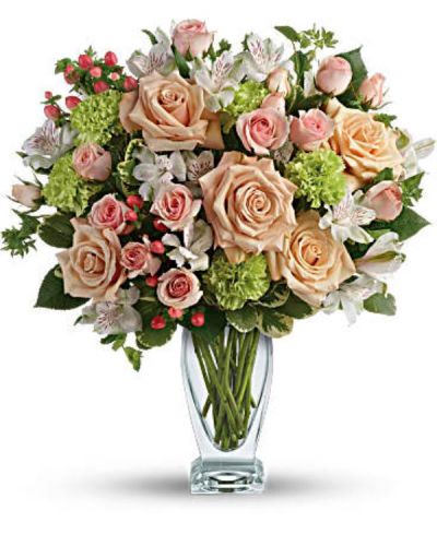 <div class="m-pdp-tabs-description">
<div id="mark-1" class="m-pdp-tabs-marketing-description">You'd do anything for them, so let them know how you feel by sending this generous and gorgeous arrangement. Who could ask for anything more?</div>
</div>
<p id="arrngDescp">Beautiful peach roses and spray roses, white alstroemeria, brilliant green carnations, peach hypericum and fresh garden greens are perfectly hand-arranged in a feminine Couture Vase.</p>