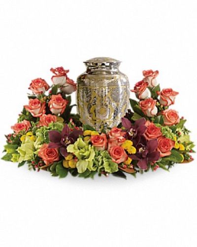 <div class="m-pdp-tabs-description">
<div id="mark-1" class="m-pdp-tabs-marketing-description">A rich and subtly hued garden expresses sympathy most thoughtfully, in a gentle oval arrangement that honors and embraces a cherished memory.</div>
</div>
<p id="arrngDescp">Orange roses blend with other beautiful flowers such as stems of cymbidium orchids, gladioli, chrysanthemums, hypericum and other delicate greens.</p>
<p>Please note: Arrangement does not include urn.</p>